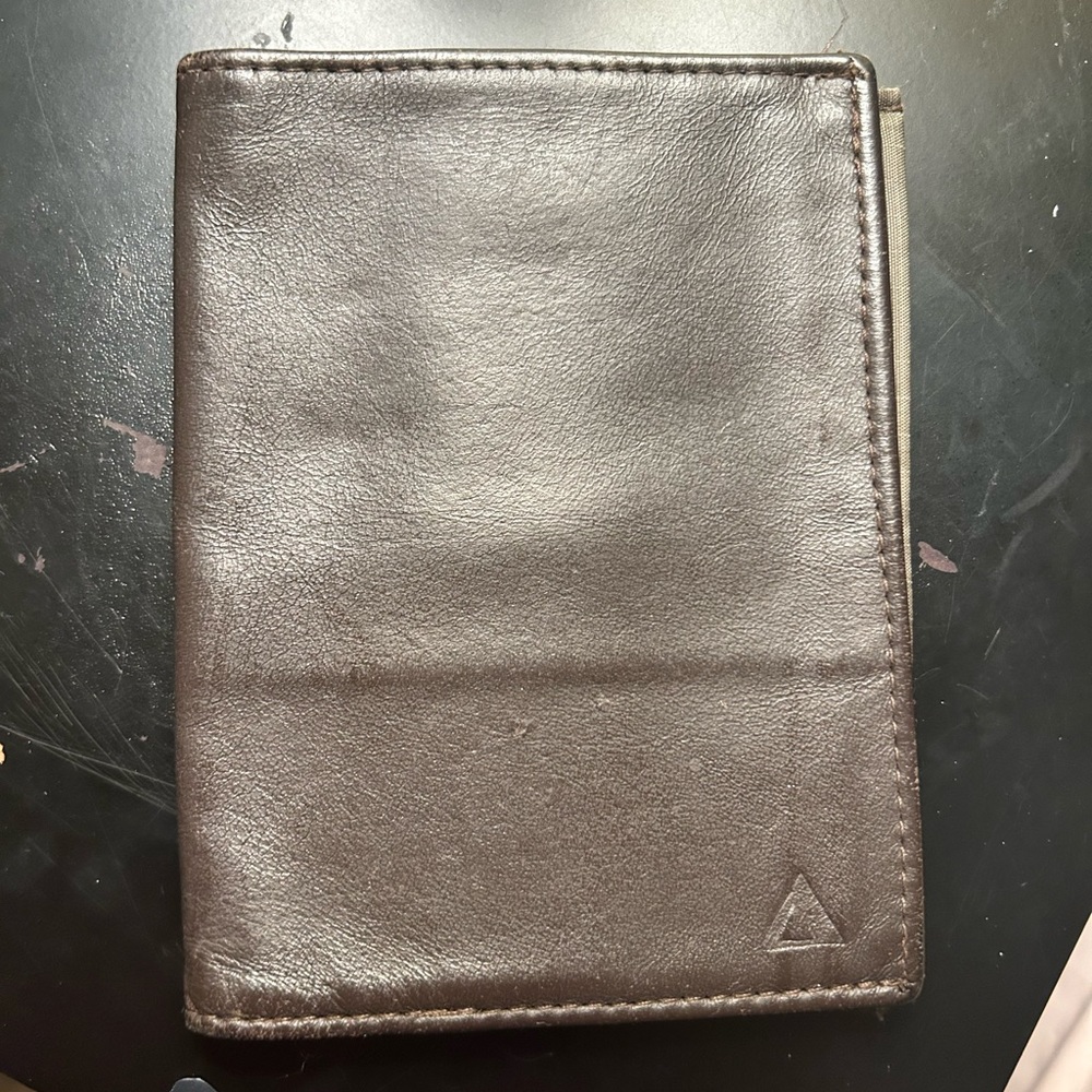 Dark brown bifold leather wallet